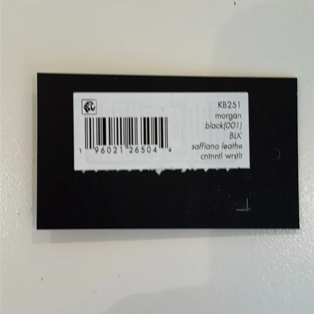 New Kate Spade Leather Black Wristlet Clutch.